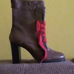 Cute lace up boots. Never been worn.